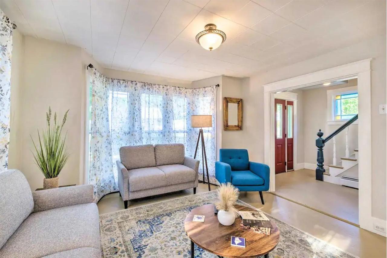 a living room with a couch and a table at Charming Bingham Home Near Outdoor Adventure, Pet Friendly! in Bingham