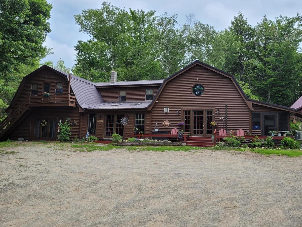 a large wooden house with a gambrel at Silver Lake Inn in Lee